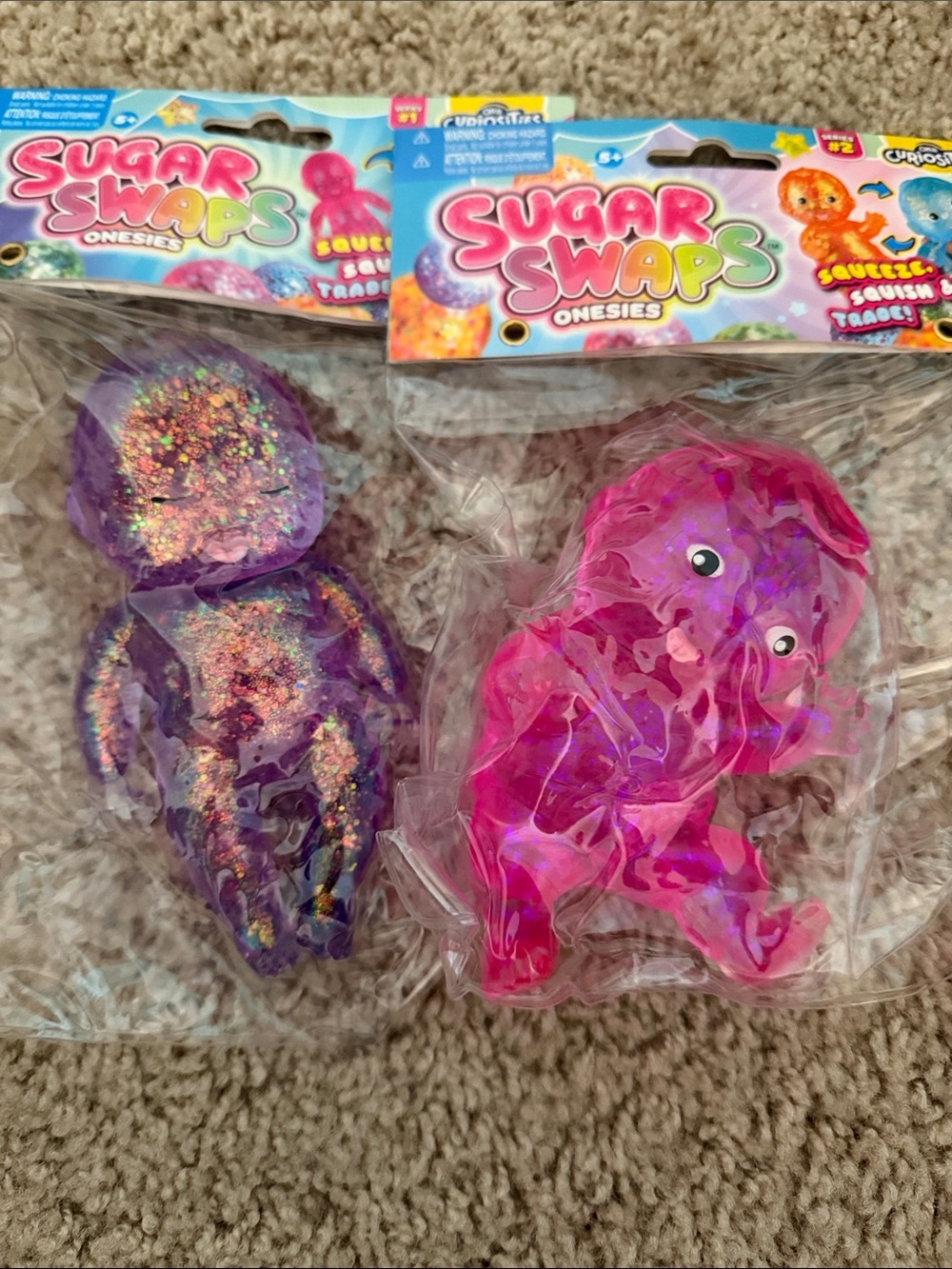 Squishy Onesies Kids Toy - Pink and Purple Sugar swaps